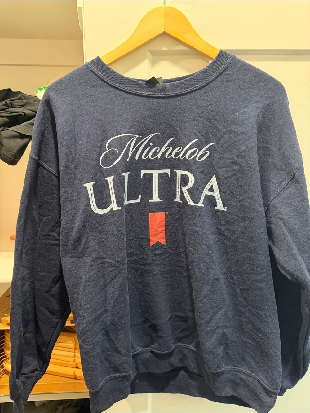 Gildan Navy Crewneck Sweatshirt with White Michelob Ultra Logo and Red Accent